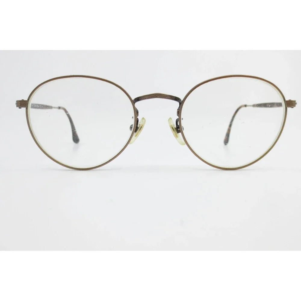 Calvin Klein 127 570 Round Metal Eyeglasses Bronze Tortoise Engraved Frames